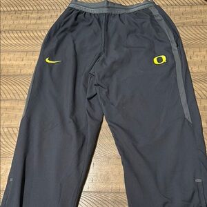 Nike Black Track Pants with Yellow Logo